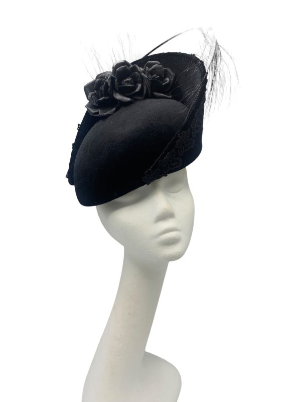Stunning black velvet large teardrop headpiece with an ostrich feather detail to finish.